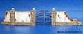 Wall with metal gate